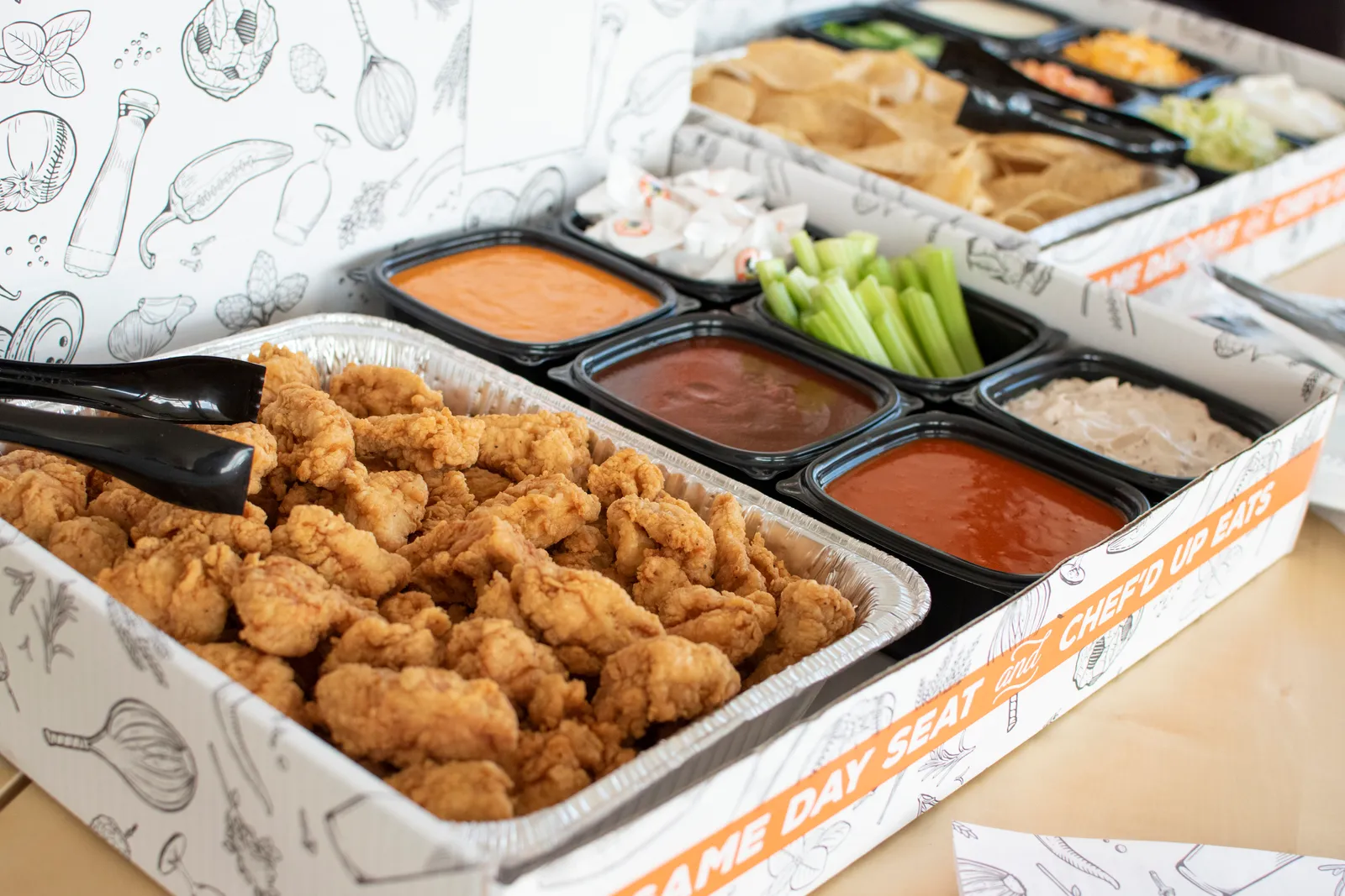 A photo of Wings &amp; Rings catering boxes