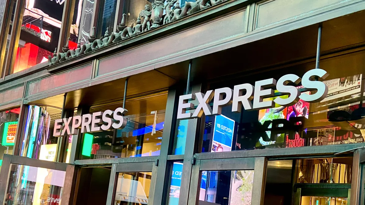 The entrance to a store with the word "Express" repeated above each glass door.