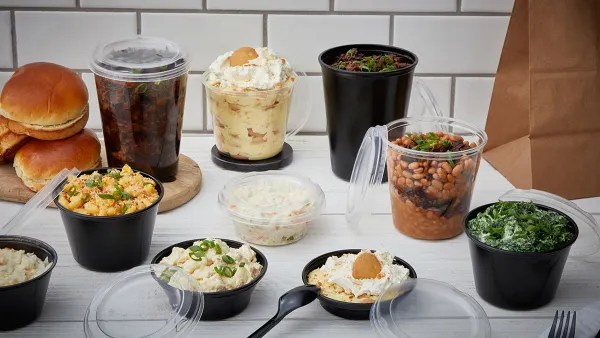 Various sizes and shapes of plastic containers with food inside.