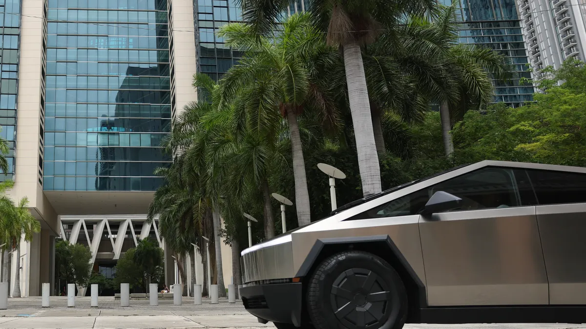 A Tesla Cybertruck in front of a Miami courthouse on July 14, 2025