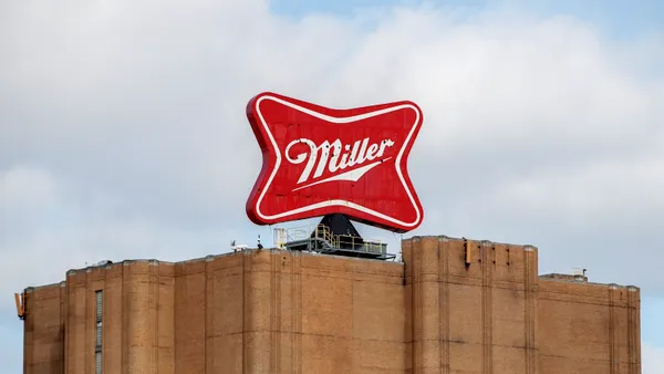 A Miller beer sign sits atop a building on the Molson Coors Brewing Co. campus on February 27, 2020 in Milwaukee, Wisconsin.