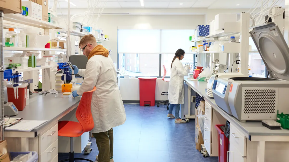 Scientists working in Prologue Medicines' laboratory.