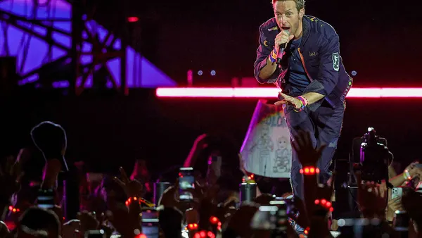 Chris Martin of Coldplay performs on a stop of the band's Music of the Spheres world tour at Allegiant Stadium on June 06, 2025 in Las Vegas, Nevada