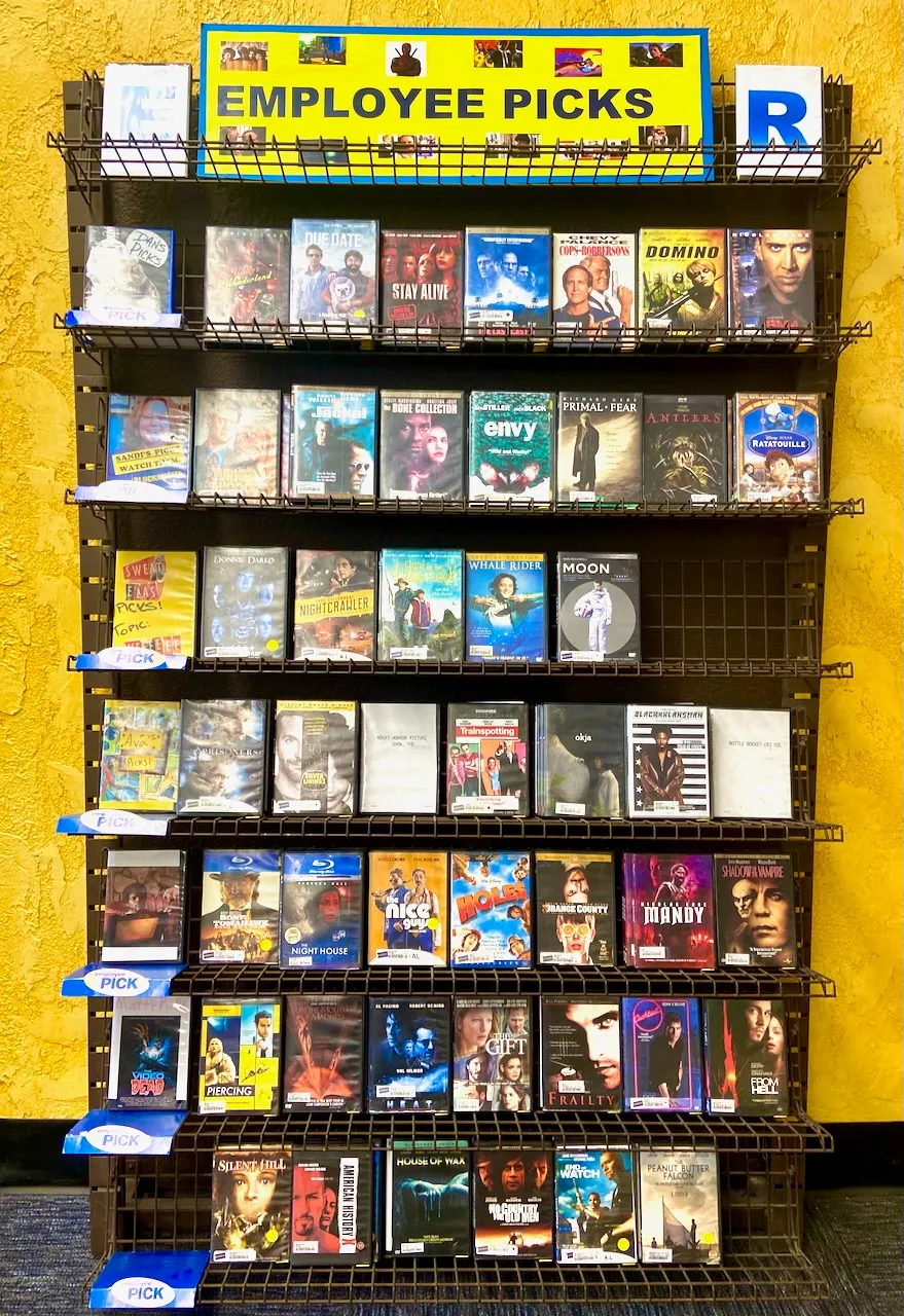 Shelves of &quot;staff picks&quot; at a video store.