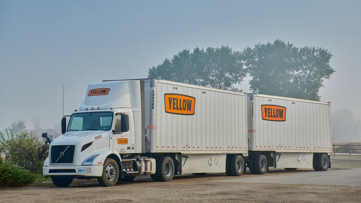 A Yellow Corp. truck on the road.