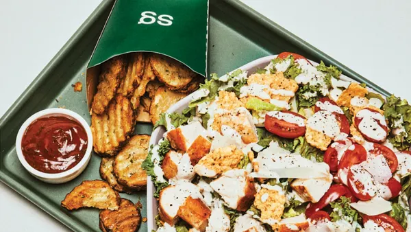 A Sweetgreen salad and an order of air fried potatoes.