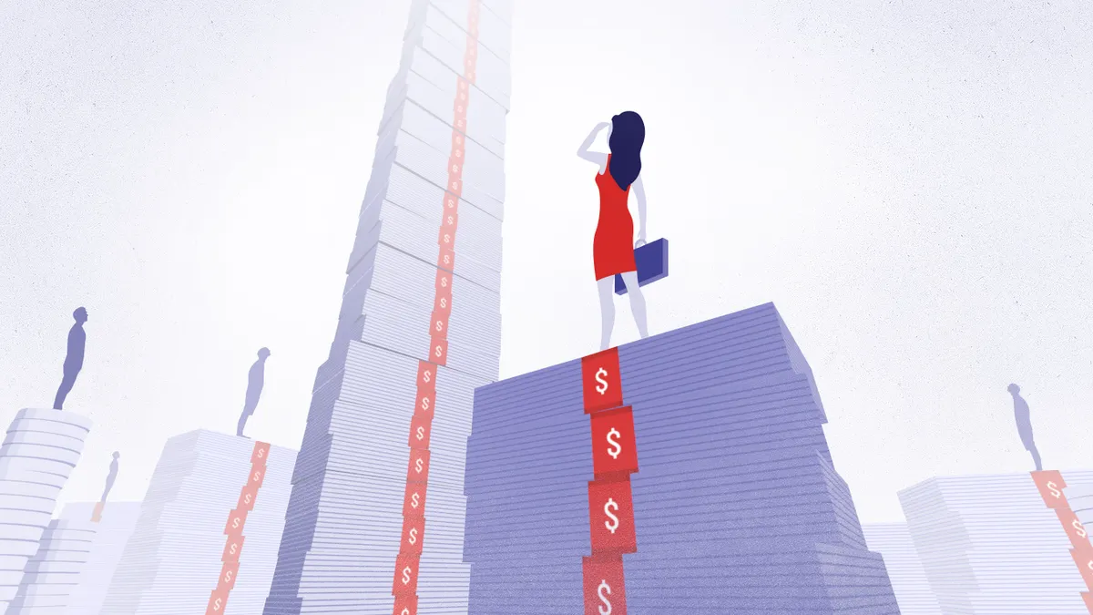 Woman with briefcase looking up at towers of cash.