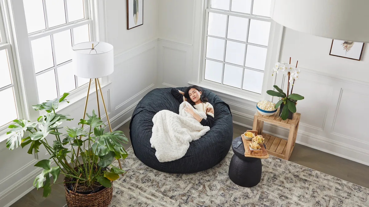 Woman sitting on bean bag