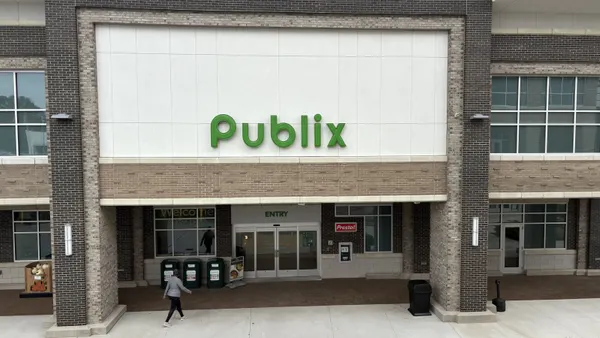 Exterior of a grocery store with a sign over the entrance that says "Publix."