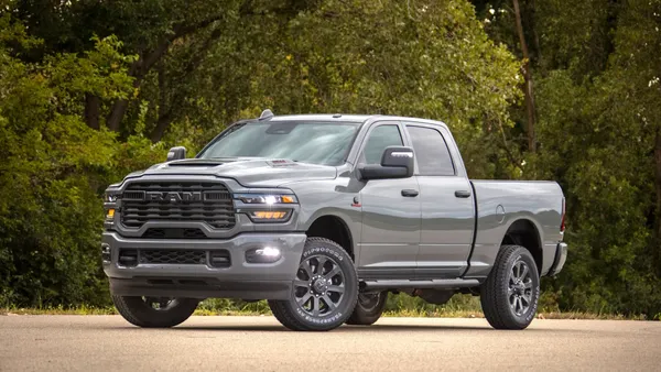 The Ram 2500 Black Express from the front, parked on a dirt lot.