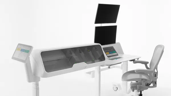 The physician console and chair for the Sentante robotic system is shown against a white background.