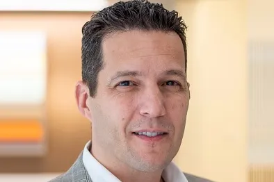 a headshot of Leos Basola, the new CFO of Spire Global