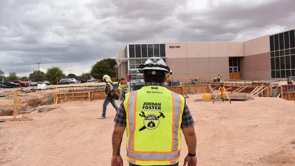 Jordan Foster Construction worker walks the Eastside Operations Center facility site