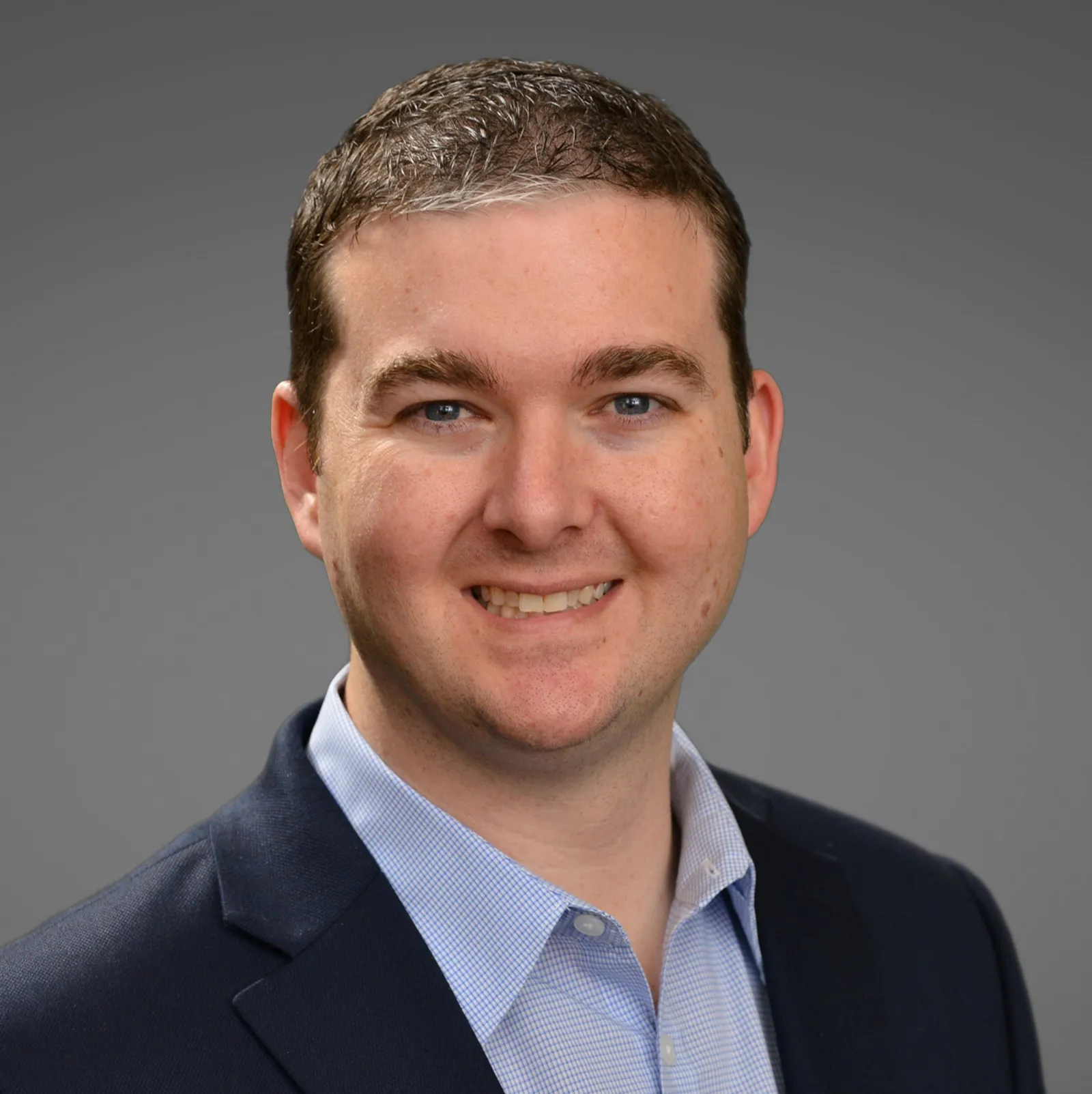 headshot of Jared Hostmeyer, senior director of product management at Wolters Kluwer ELM Solutions