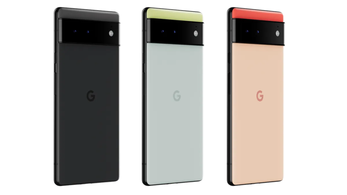 Three different colors of Google Pixel 6 smartphones standing up with the 'G' Google logo on the back: one phone is black, one silver, one rose gold.