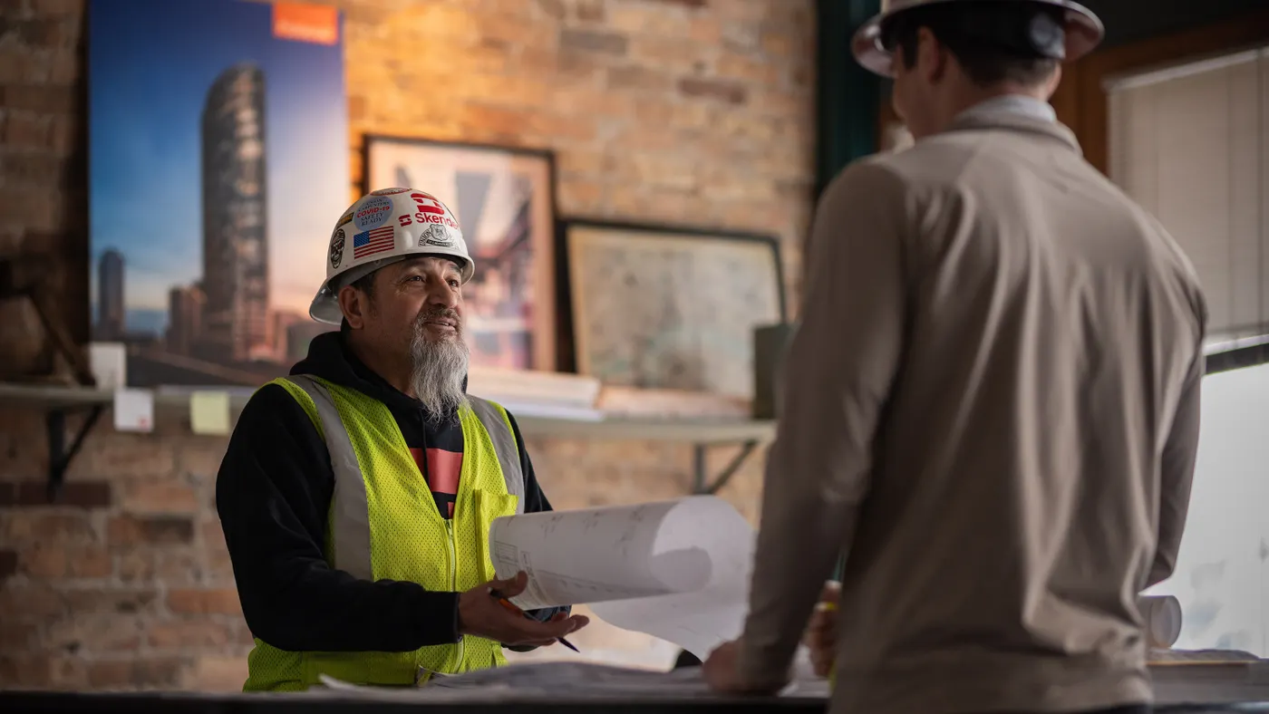 A seasoned professional gives advice to an early career worker.