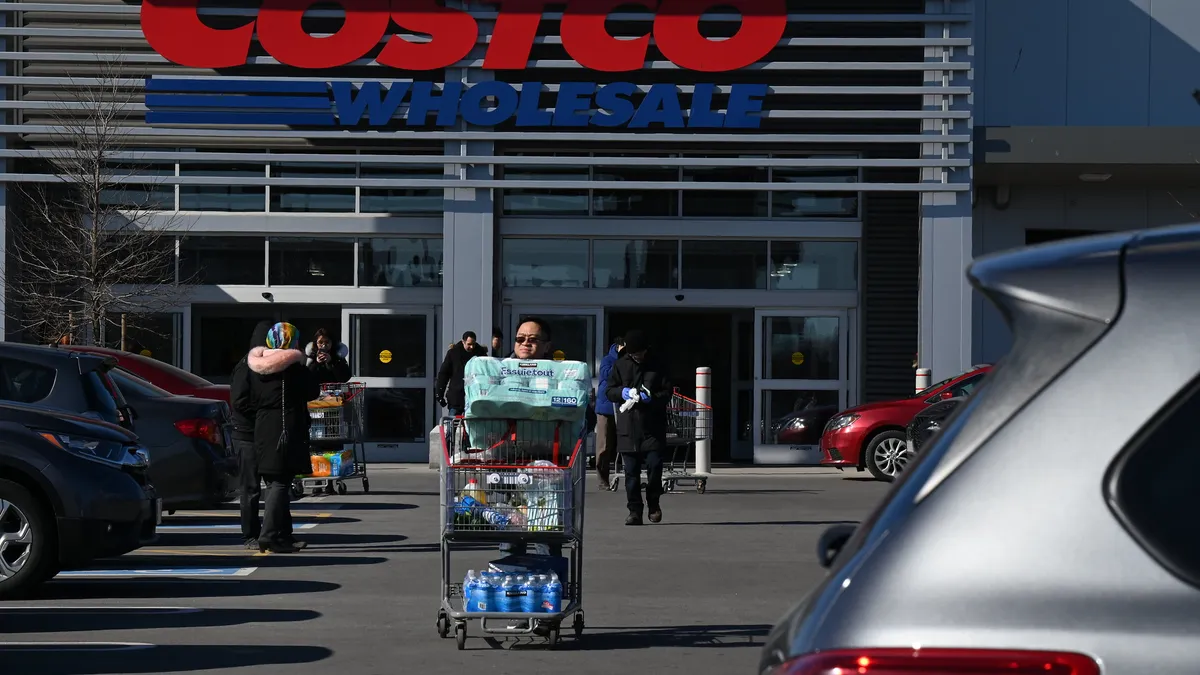 Bottled water and toilet paper were popular items among shoppers at Costco in Toronto on Sunday morning, March 15, 2020.