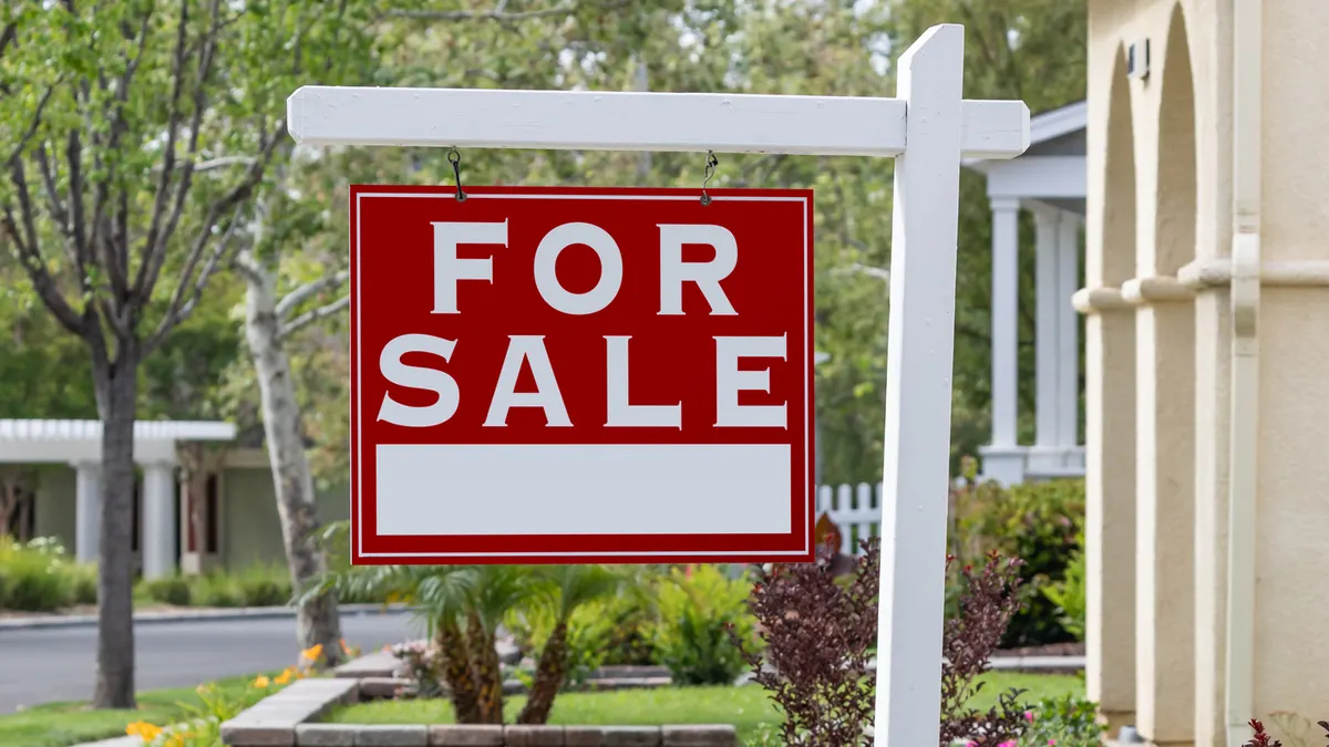For Sale Real Estate Sign in Front of New House
