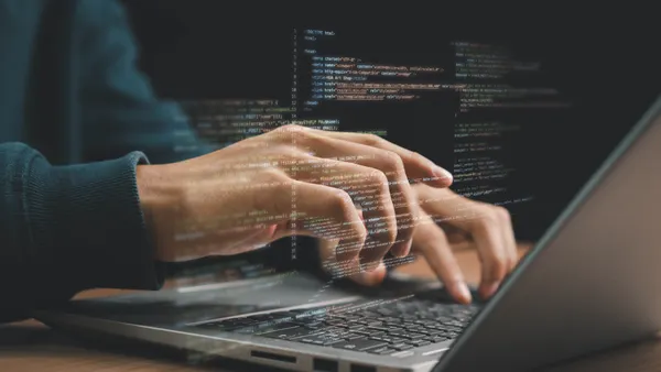 Software coding on laptop
