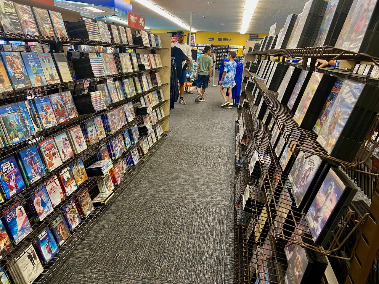 An aisle in a video rental store.