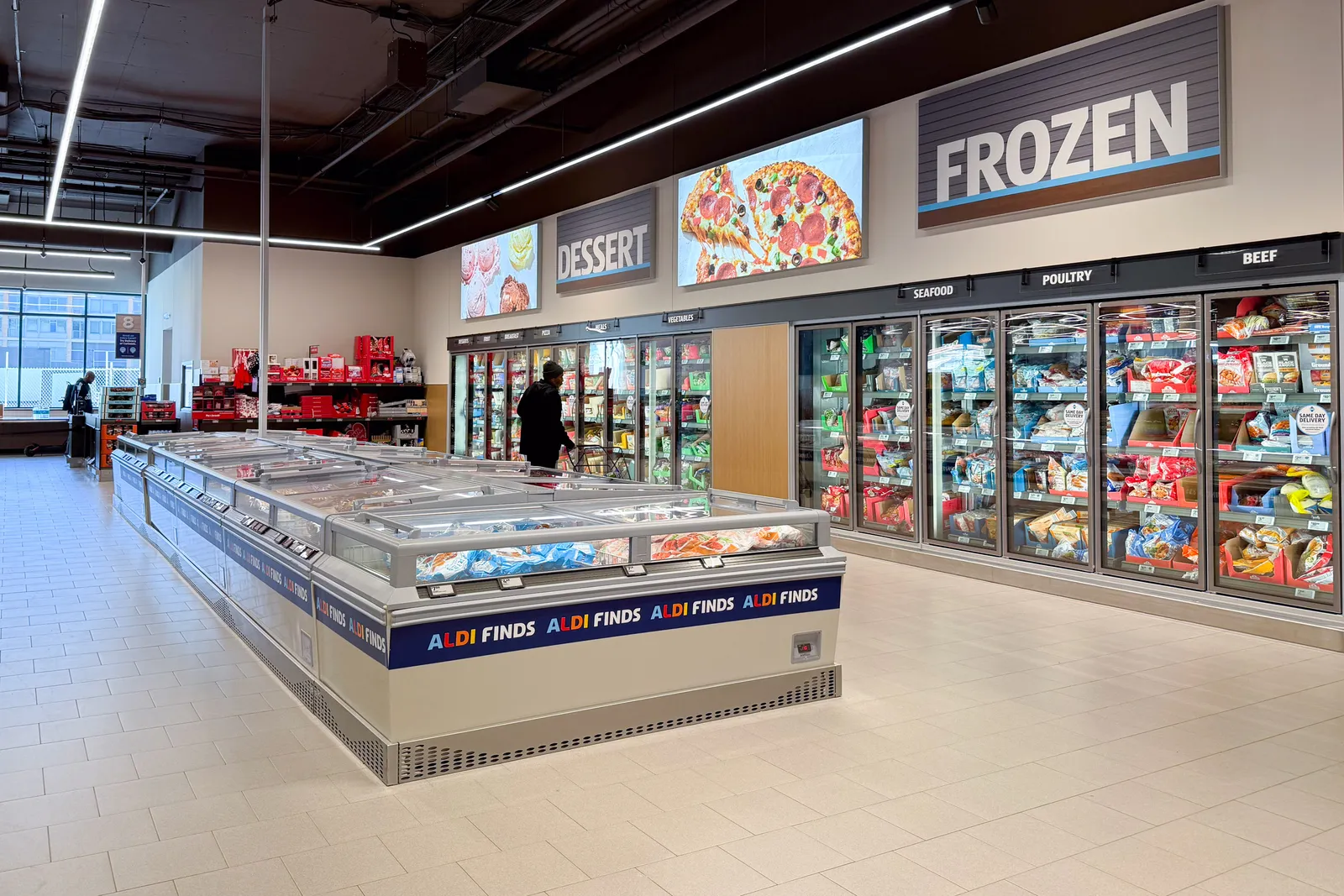 Frozen foods section of a grocery store.