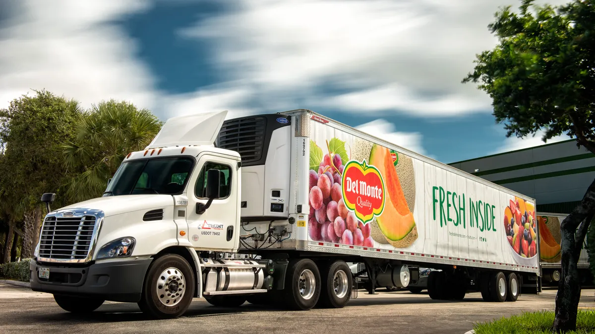 A upfront view of a Fresh Del Monte truck