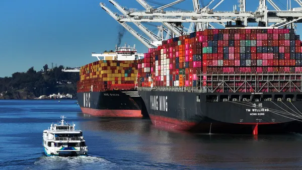 In an aerial view, container ships sit docked at the Port of Oakland on December 09, 2024 in Oakland, California.
