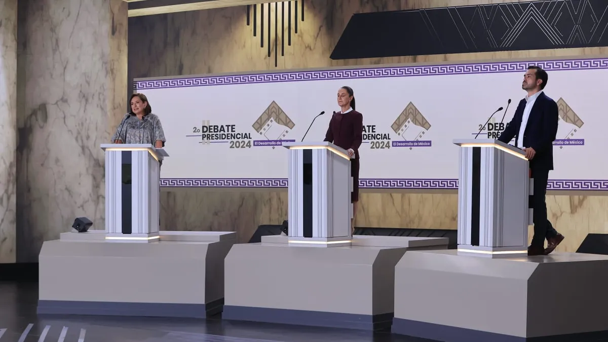 Mexico's presidential candidates stand at podiums during the country's second presidential debate on Sunday, April 28, 2024.