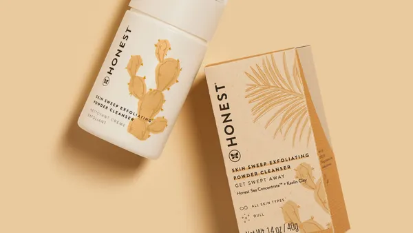 A warm beige makeup bottle with a drawing of a cactus on it