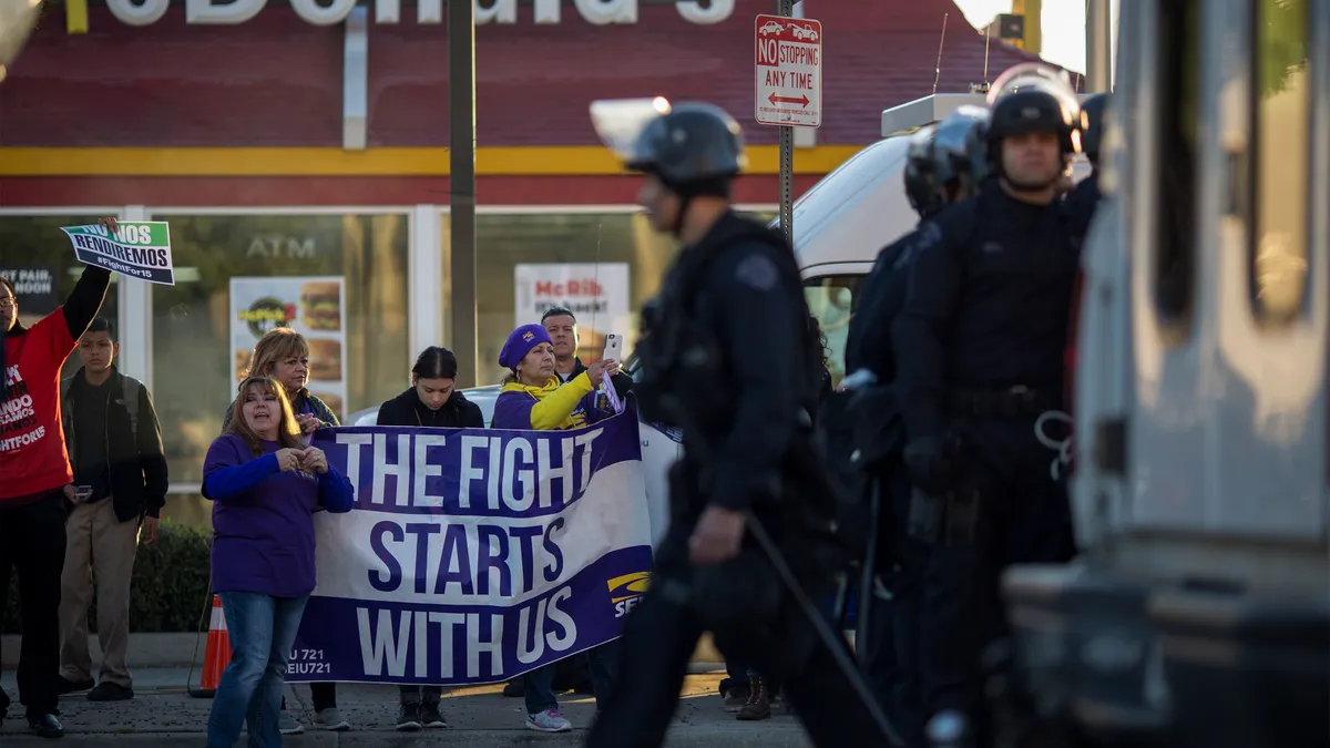 Workers demonstrate outside a Los Angeles McDonald's as part of Fight for $15's November 2016 day of action.