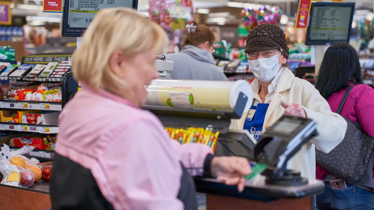 Grocers allow employees to wear masks, gloves