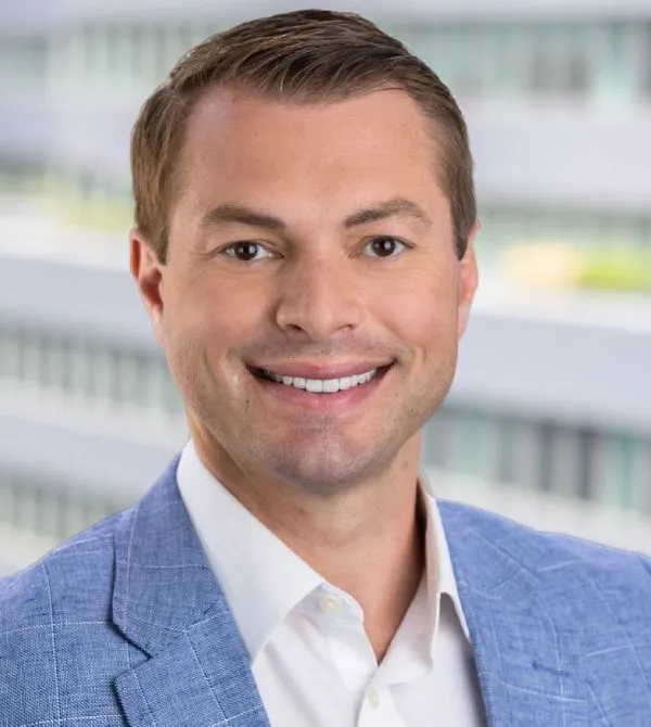 A headshot of Scott McKinney, CFO of Tiptree