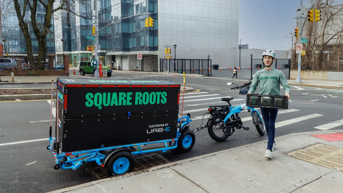 URB-E delivery vehicle with Square Roots logo in New York City