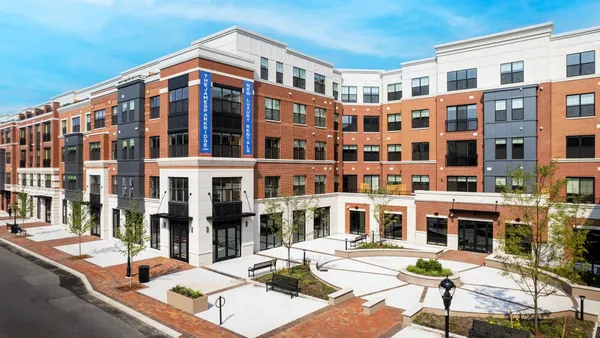 New mid-rise brick apartment building