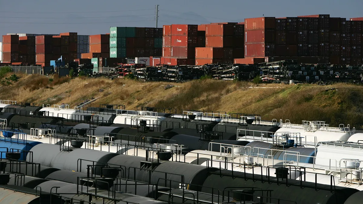 Trains of tank cars are seen near shipping containers at the ports of Long Beach and Los Angeles on July 6, 2006 in Long Beach, California.