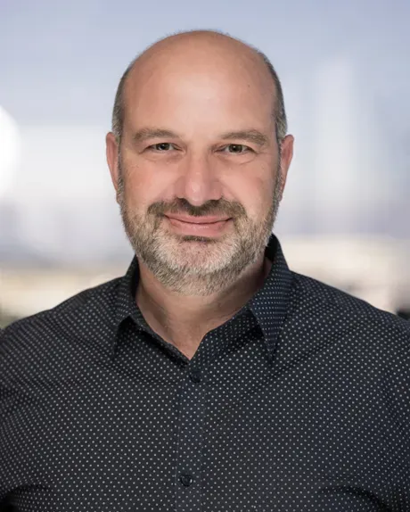 A corporate headshot of GM's former Chief AI Officer Barak Turovsky.