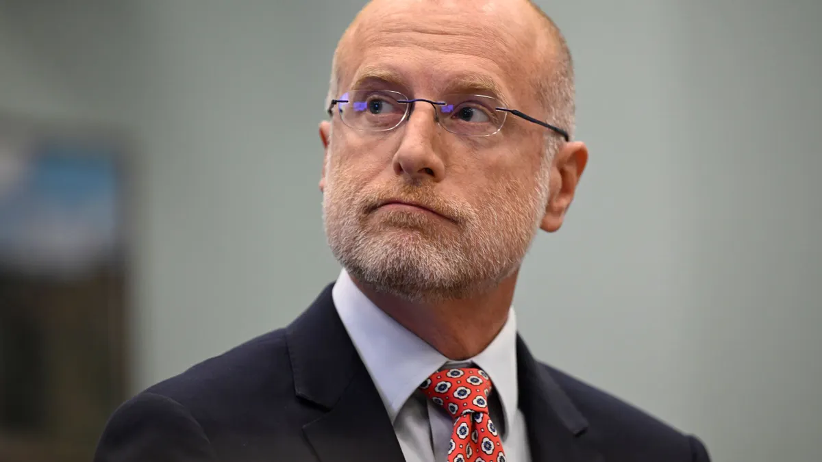 Brendan Carr looks to the left during his first appearance at a Congressional hearing.