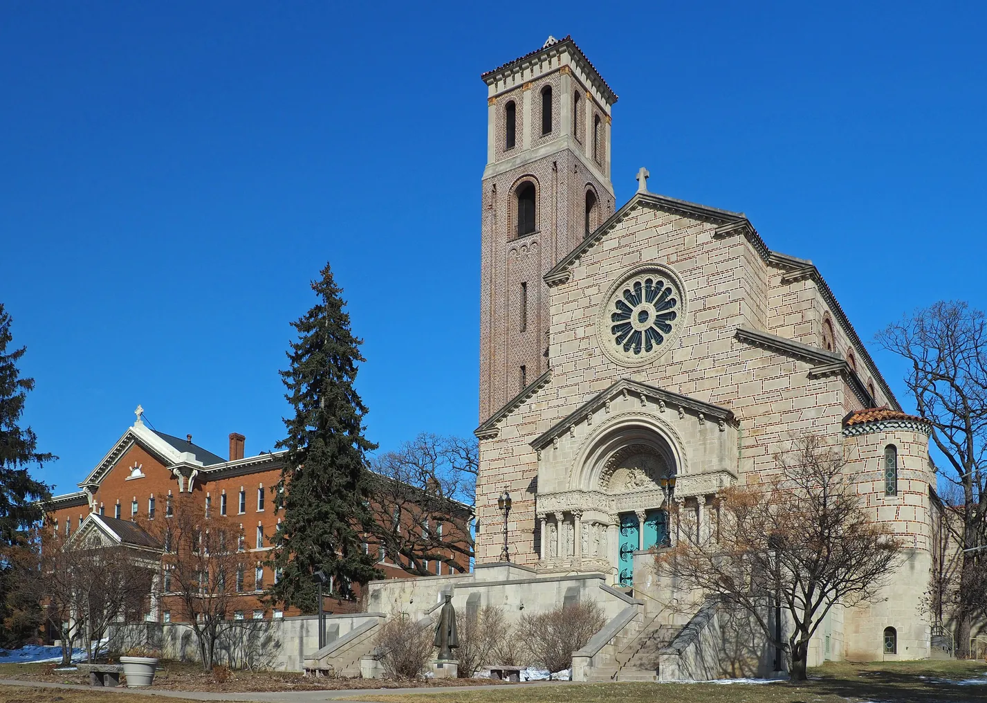 Looking up at Derham Hall and Our Lady of Victory Chapel.