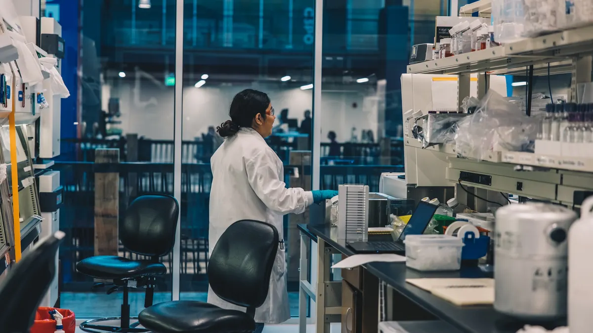 A woman works in one of Recursion's labs.