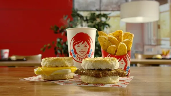 A promotional image for Wendy's 2-for-$3 breakfast bundles.