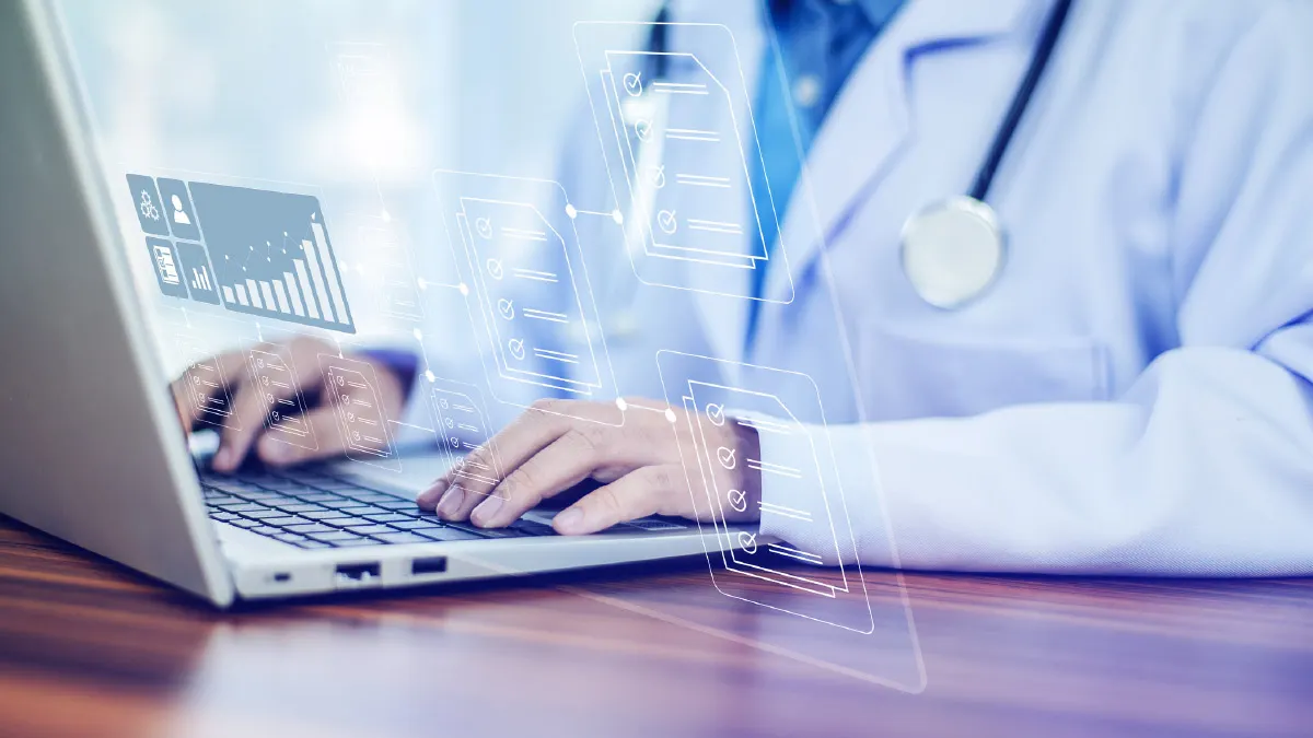 Doctor use computer connection server data base patient for technology treatment in hospital.