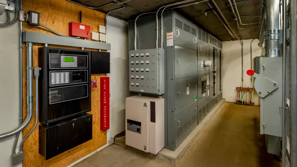A facilities management room with building automation equipment.