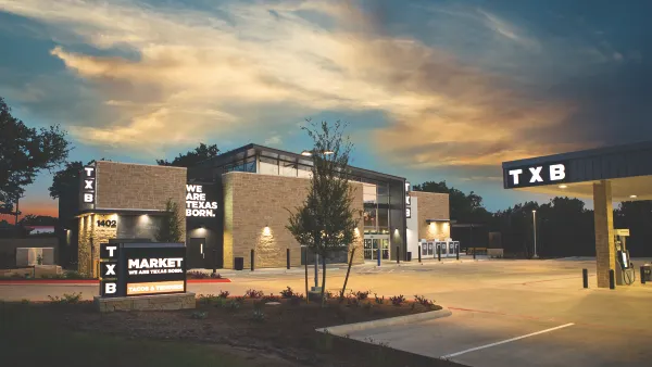 A photo of a store at sunset. A sign out front says "TXB Market. We are Texas Born. Signs on the building and fuel canopy say TXB and another sign on the store says We Are Texas Born.