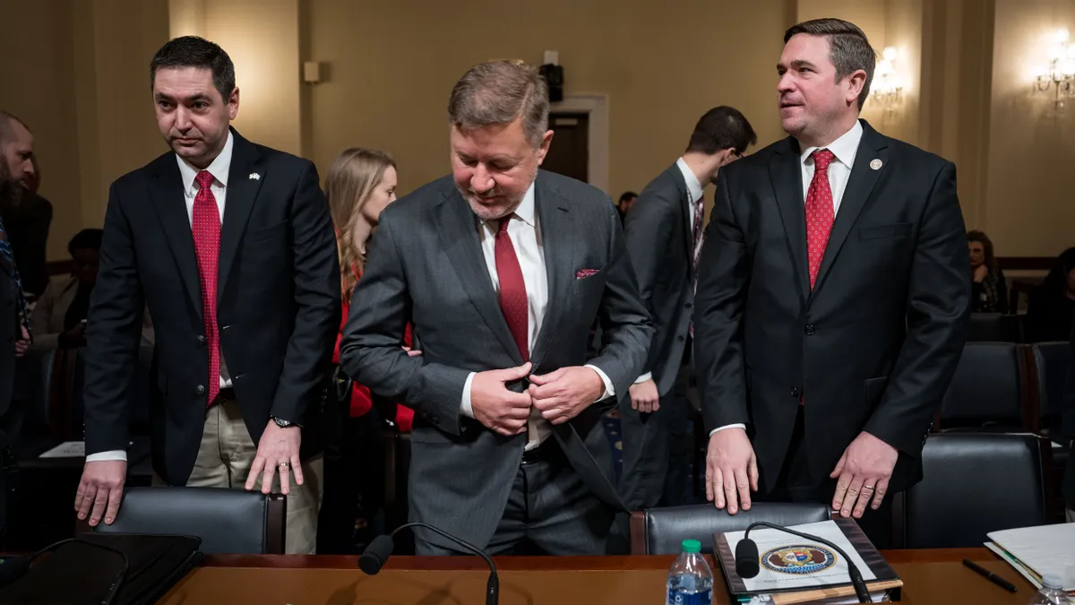 Montana Attorney General Austin Knudsen, Oklahoma Attorney General Gentner Drummond and Missouri Attorney General Andrew Bailey stand at a House Homeland Committee hearing