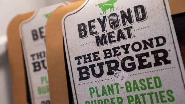 Beyond Meat's The Beyond Burgers in their packaging.