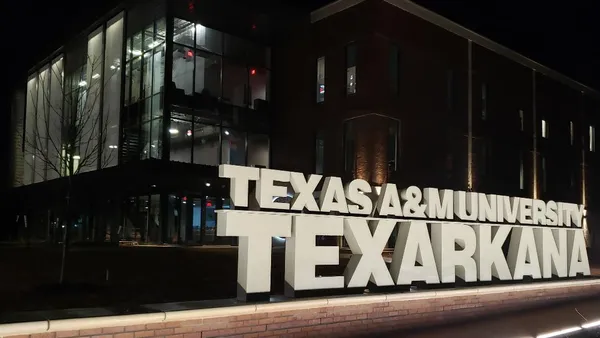 Texas A&M University-Texarkana signage next to campus building