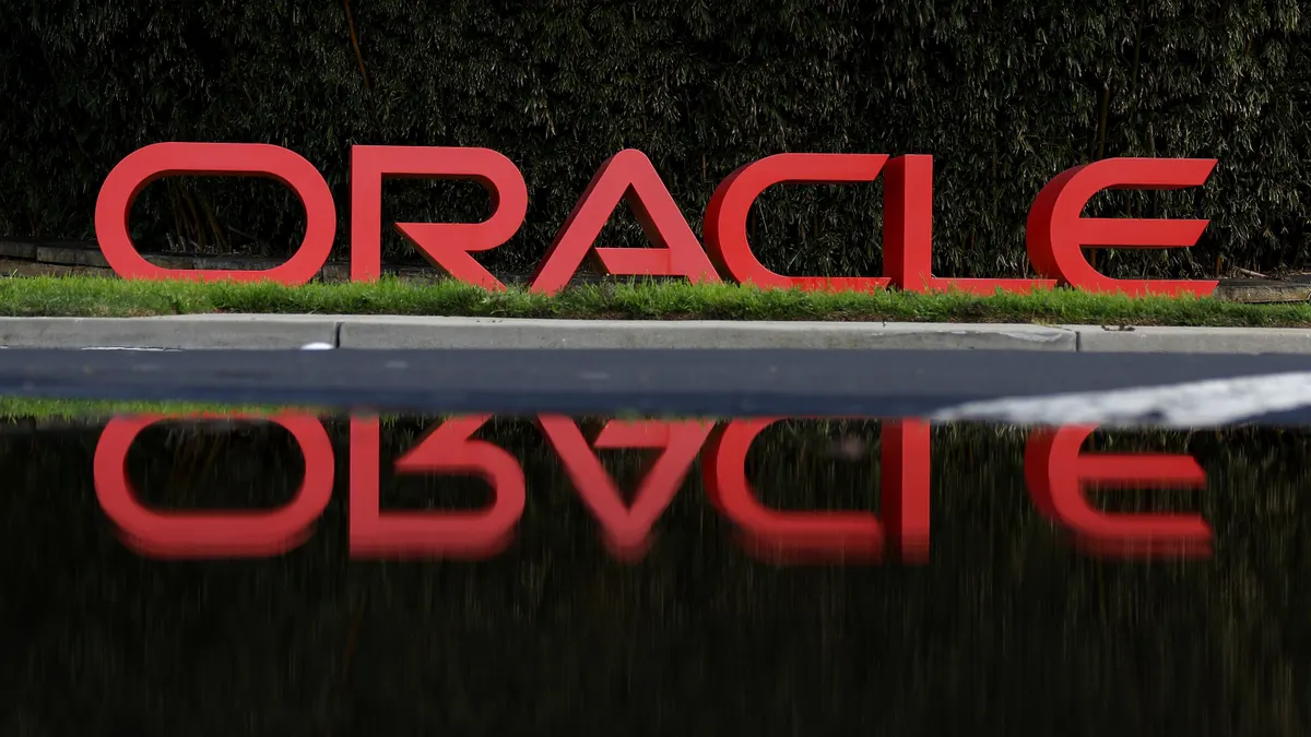 A sign is posted in front of Oracle headquarters on March 11, 2024 in Redwood Shores, California