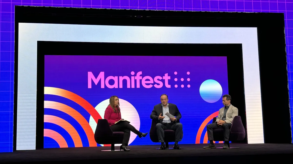 Speakers speak on a panel at Manifest Vegas 2024.