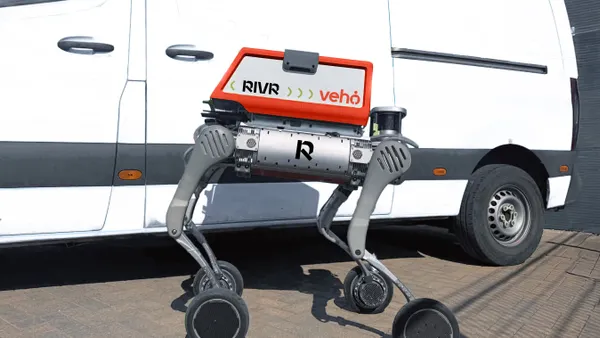 A four-legged robot with wheels stands next to a delivery van. The logos for Veho and RIVR are displayed on the robot.
