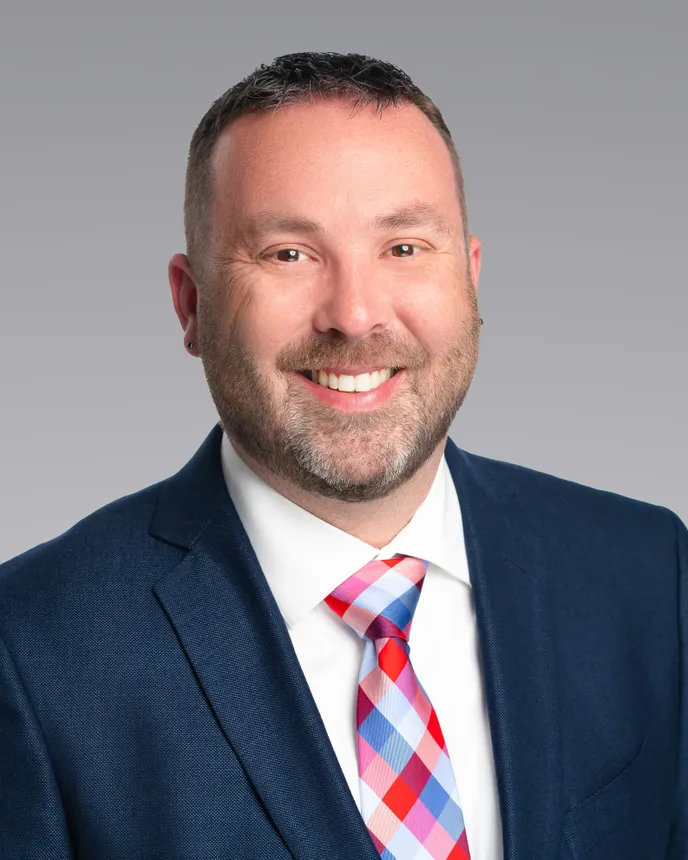 headshot of John Heinen